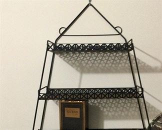 one of two metal wall shelves