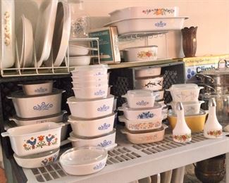 lots of vintage Corning ware, lots of patterns, plain white, and patterns