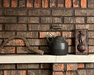 Antique cast iron tea kettle, hook blade, and Case statue