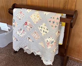 Nice quilt rack and vintage quilts 