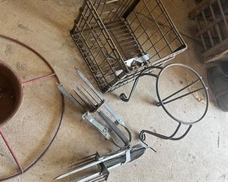 Milk crate, mole traps, & plant stand