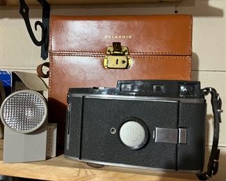 Vintage Polaroid camera with case