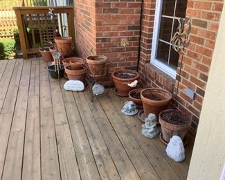 Clay pots , Shepard hooks and other outdoor items
