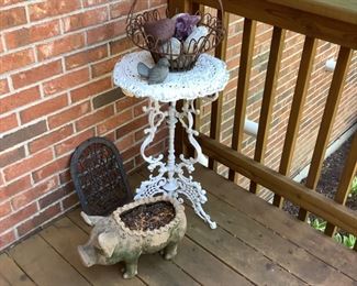 cast iron plant holder and other yard art 