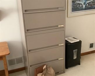 Metal five drawer filing cabinet..measures 30” w x 65” h x 18” d.  Available presale $95.  office max shredder model om04692.