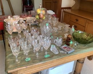 Other sets of glasses plus Crate and Barrel wine glasses.