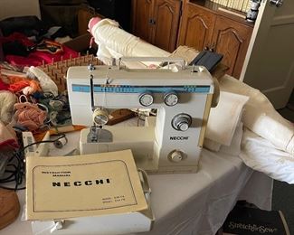 Necchi Sewing machine - bolts of fabric, 