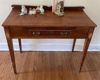 Hall table with wood inlays