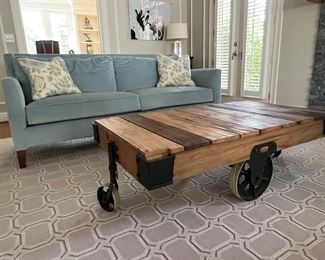 Blue sofa stays with house