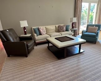 Room size rug is 12 x 15, white sofa stays with house