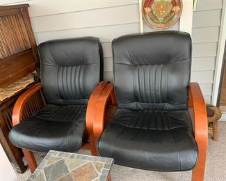 #20 Two Black Faux Leather Chairs w/wood Legs (as is finish on wood) $40.00