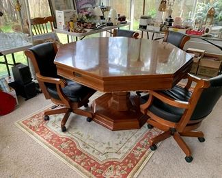 #51 Brunswick Game Table w/4 Chairs (raises & Lowers) (top converts to regular table) (chairs have some scratches and tears) - 54x31 $2500.00