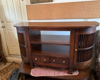 #56 Oval front flat back Wood TV Cabinet w/Spindle Sides w/2 drawers & 2 shelves - 55x20x30 $75.00