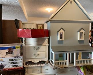 #63 Cream Bedside Table w/3 drawers 24x15x25 $20.00
#58 Homemade Doll House - 44x24x63 $75.00