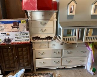#63 Cream Bedside Table w/3 drawers 24x15x25 $20.00
#58 Homemade Doll House - 44x24x63 $75.00 #62 Cream Laminate Dresser w/mirror - Dresser w/7 drawers - 56x15.5x32 $75.00