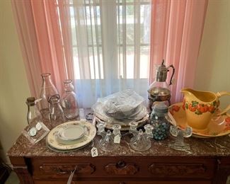 candlesticks ..marble top chest of drawers..pitcher an bowl..marble..