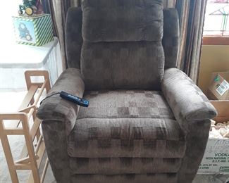 Lazboy Lift chair,
 in good condition,  working,
With vibrations,  heat and other features 