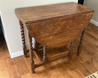 Antique gate-legged table, some damage to top but legs in good condition (for an antique)