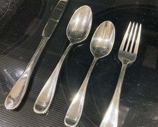 Oneida silverware (originally from Macys) 8 of each plus serving spoon/fork.