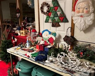 Plastic bins for storage, lots of ornaments, village pieces, stocking hangers and more