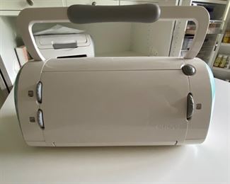 Cricut machines; model CRV001 (one included with the cabinet)