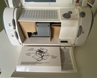 Cricut machines; model CRV001 (one included with the cabinet) 
