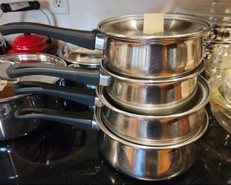 Kitchen Ware and Dishes. Several sets of kitchen dishes from the vintage to the contemporary. Epoch dinnerware, Unicorn dinnerware, Denby bowls and some Fiesta ware. Pyrex casseroles, sets of silverware, cooking tools and many sets of glasses. Shown a set of Royal pots. 