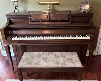 Chickering piano and bench (with sheet music)