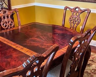 Mahogany dining table with Chippendale style chairs (includes 2 leafs)