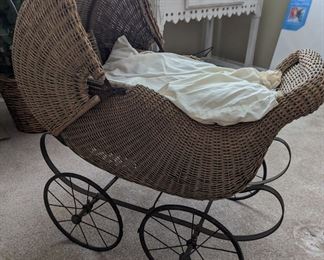 Vintage wicker baby stroller