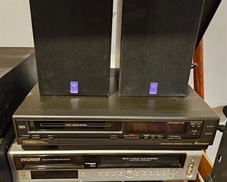 $15 Mitsubishi VHS, $20 Sylvania VHS/5 CD, $10 speakers set