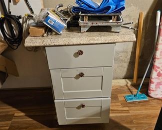 $40, Cabinet w/laminate top, bottom drawer shuts, just a bad picture