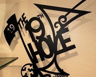The 19th hole metal wall sign