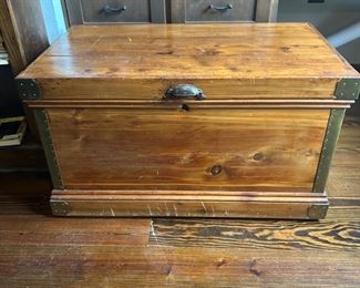 Pine chest lined in cedar. Lots of storage.