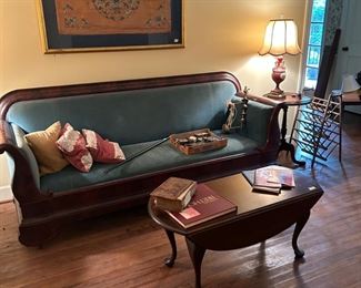 Lovely sofa with coffee table and end tables. Some of our many lamps.