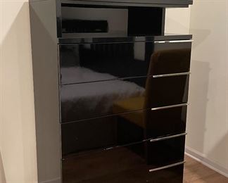 Mid-Century Black Lacquer Chest of Drawers WIth Chrome Drawer Pulls. Measures 36" W x 19" D x 54" H.