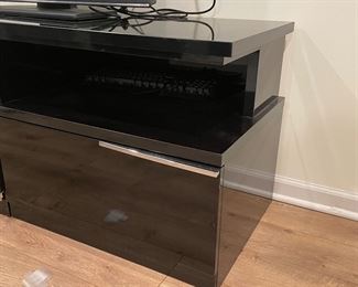 Mid-Century Black Lacquer C-Style Side Table - 2 Available. Each Measures 19" x 27" x 23" H. One Has Chip (Pictured In Lower Left Corner).