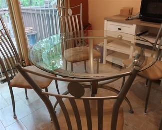 glass  top  dinette  set  and  four  chairs