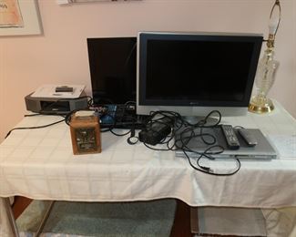 vizio tv and sony tv with dvd players, bose radio