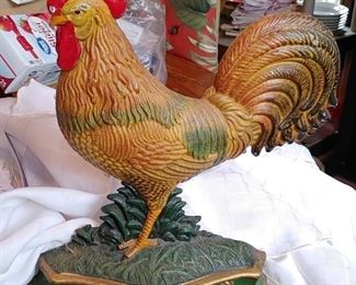 Just found! I'm telling you this house is stuffed.. heavy cast iron rooster door stop! 