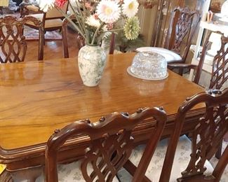 Gorgeous antique Chippendale dining room table pulls apart and leaves are underneath extends very long can seat 12 people