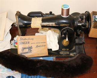 AM 2 1611 Singer Model 1591 - (1955-1956) left in working condition.