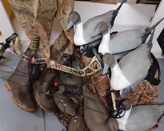 Duck decoys, crossbow...waders...great for Father's Day!