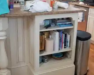 Kitchen island has a bookcase
