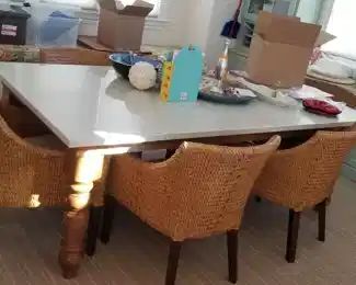Amazing granite top dining room table is 4 ft. wide x 7 ft. 4 inches long; seats 6