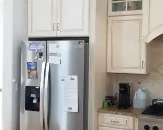 Gorgeous custom kitchen cabinets; sorry, refrigerator not available 