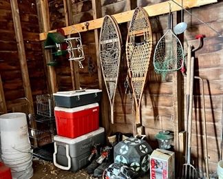 Vintage snowshoes, coolers, fishing equipment, archery target cube ..