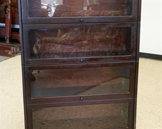 1078	MAHOGANY EMPIRE STYLE 4 SECTION BARRISTER BOOKCASE W/DRAWER & SCROLLED FEET AT BASE, APPROXIMATELY 34 IN X 14 IN X 61 IN HIGH
