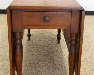 1090	ANTIQUE SOLID CHERRY DROP LEAF TABLE W/ONE DRAWER & LONG DROPS, APPROXIMATELY OPEN 63 IN X 46 IN X 29 IN HIGH, CLOSED 20 IN
