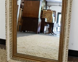1124	ANTIQUE MIRROR IN ORNATE GESSO FRAME, APPROXIMATELY 25 IN X 32 IN

